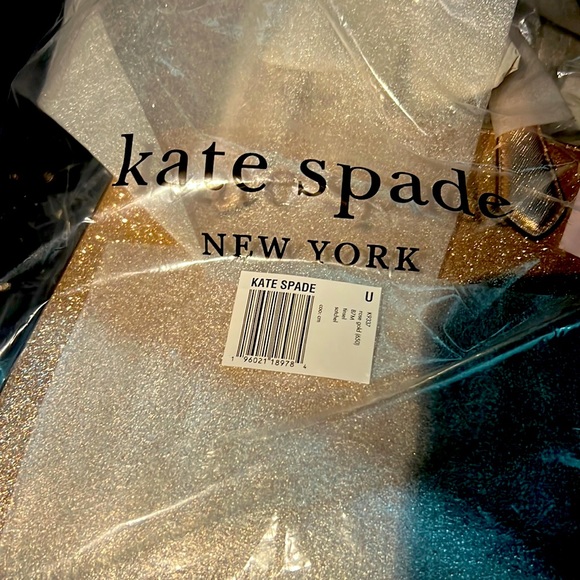 kate spade Handbags - Kate Spade Rose Gold purse brand new still in the sale bag